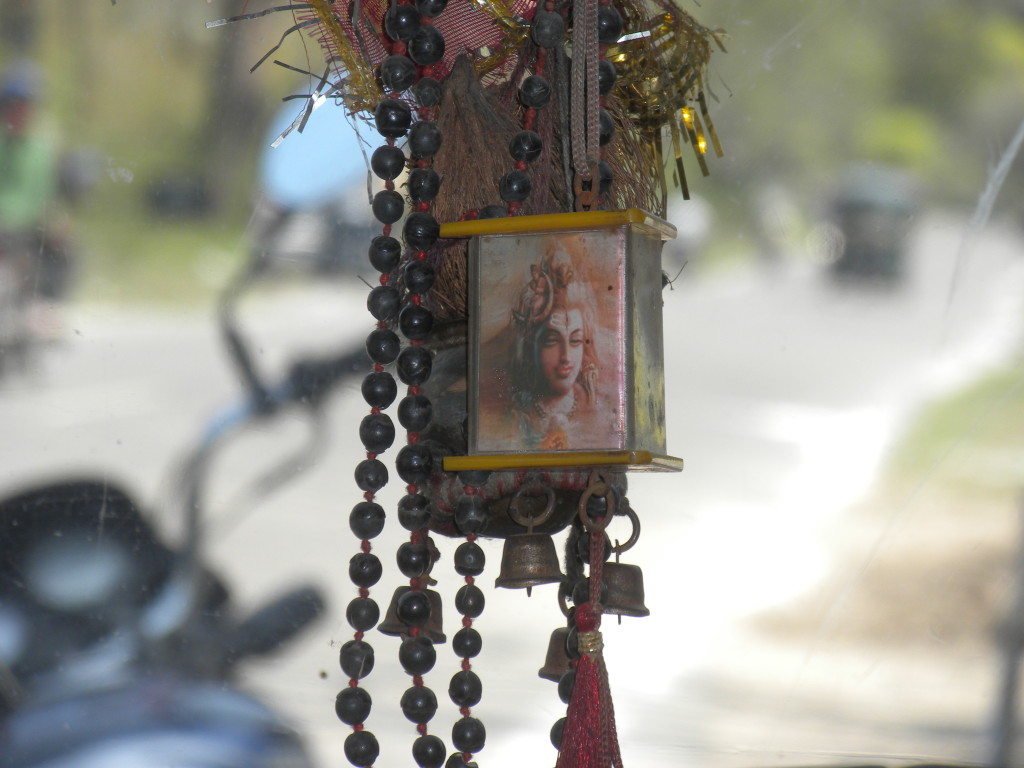 Dashboard Siva, beads, and bells